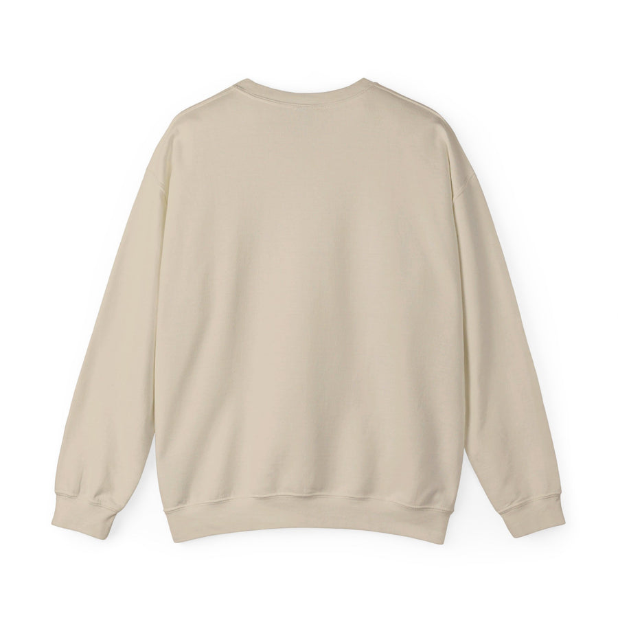 A cozy unisex heavy blend crewneck sweatshirt featuring a cat lounging under palm trees