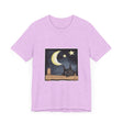 A black t-shirt featuring a sleepy cat under a moonlit night