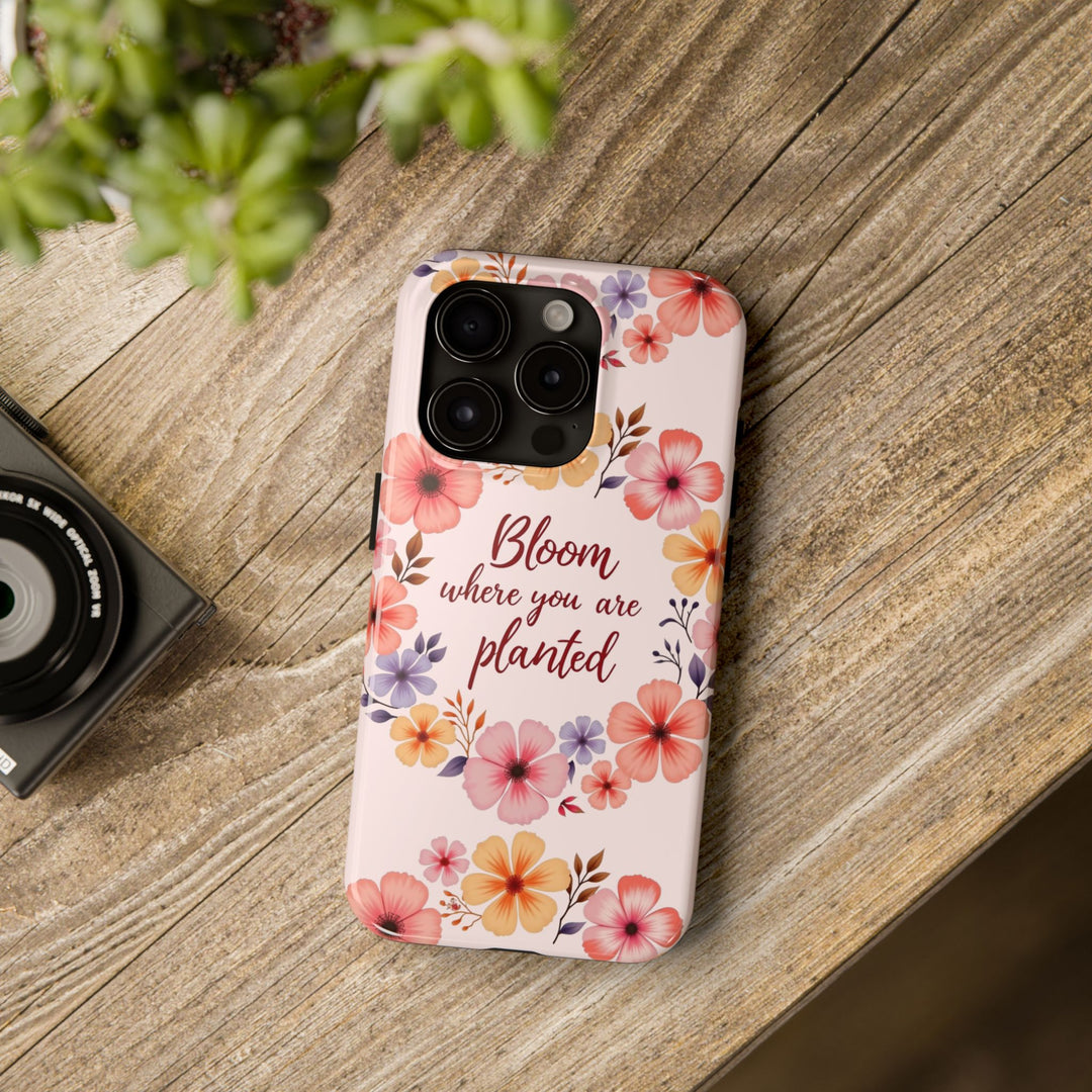 A light pink phone case with a beautiful flower garland bloom design