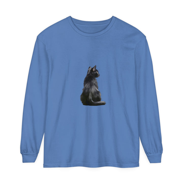 A close-up image of a black long sleeve t-shirt with a mystical black cat design