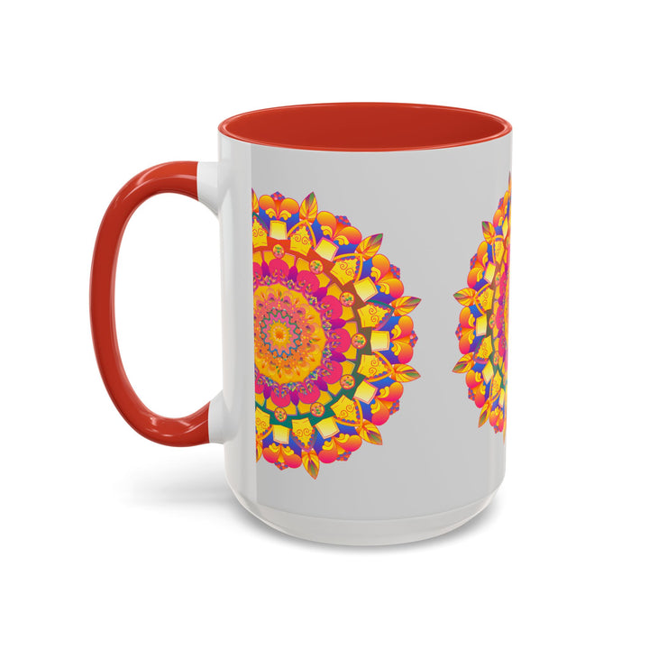 A close-up image of a ceramic mug with a mandala art design featuring vibrant colors on a grey background