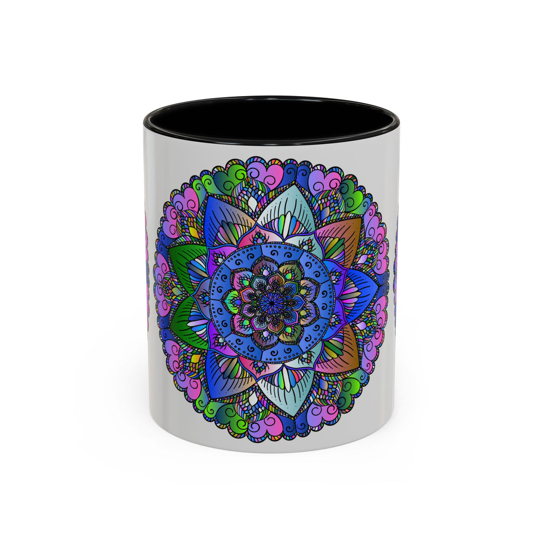 A beautifully handcrafted ceramic mug featuring a colorful mandala design, evoking a sense of peace and tranquility