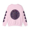 A comfortable unisex heavy blend crewneck sweatshirt featuring a vibrant purple mandala design