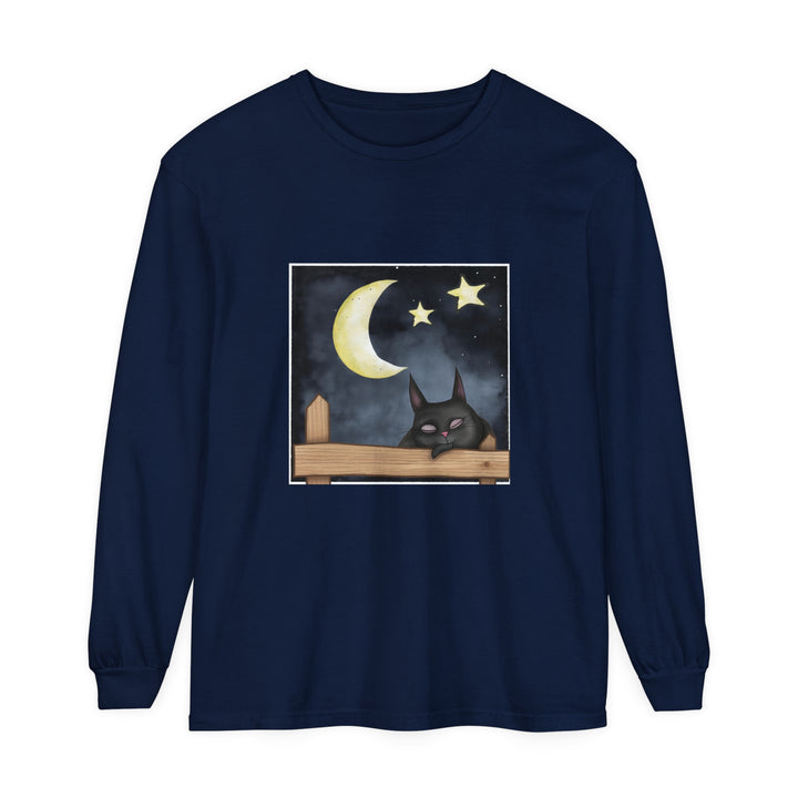 A black T-shirt with a cute illustration of a sleeping cat against a backdrop of the night sky