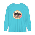 A watercolor illustration of a sleeping cat in a bowl on a long sleeve t-shirt
