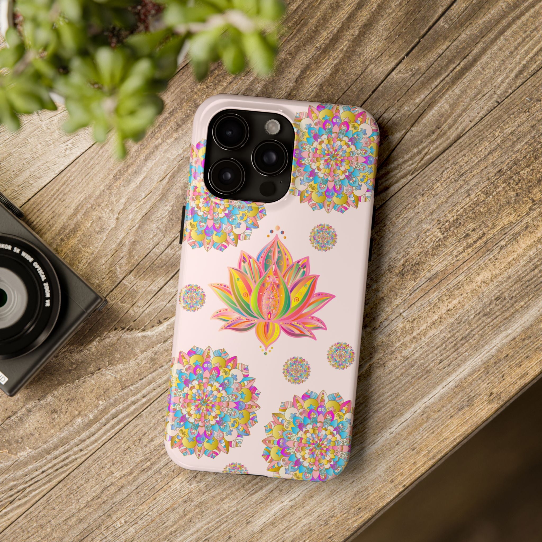 Beautiful light pink phone case with intricate lotus flower mandala design, perfect for protecting your phone in style