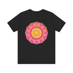 A vibrant and intricately designed mandala t-shirt in pink and yellow representing peace and harmony