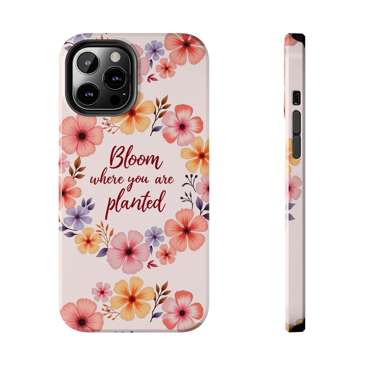 A light pink phone case with a charming flower garland bloom design