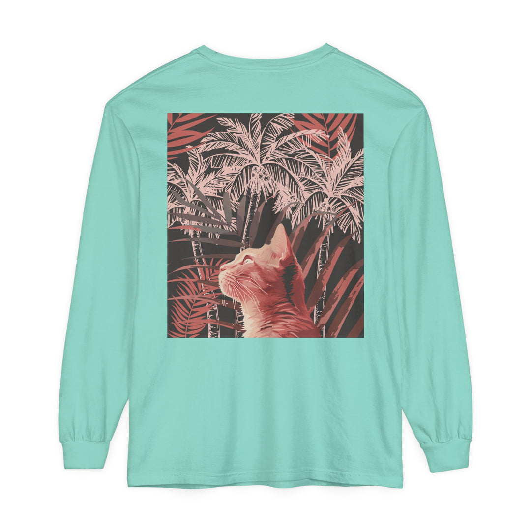 Adorable ginger cat sitting under a palm tree on a vibrant t-shirt