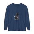 A detailed watercolor painting of a black and white cat on a long sleeve t-shirt