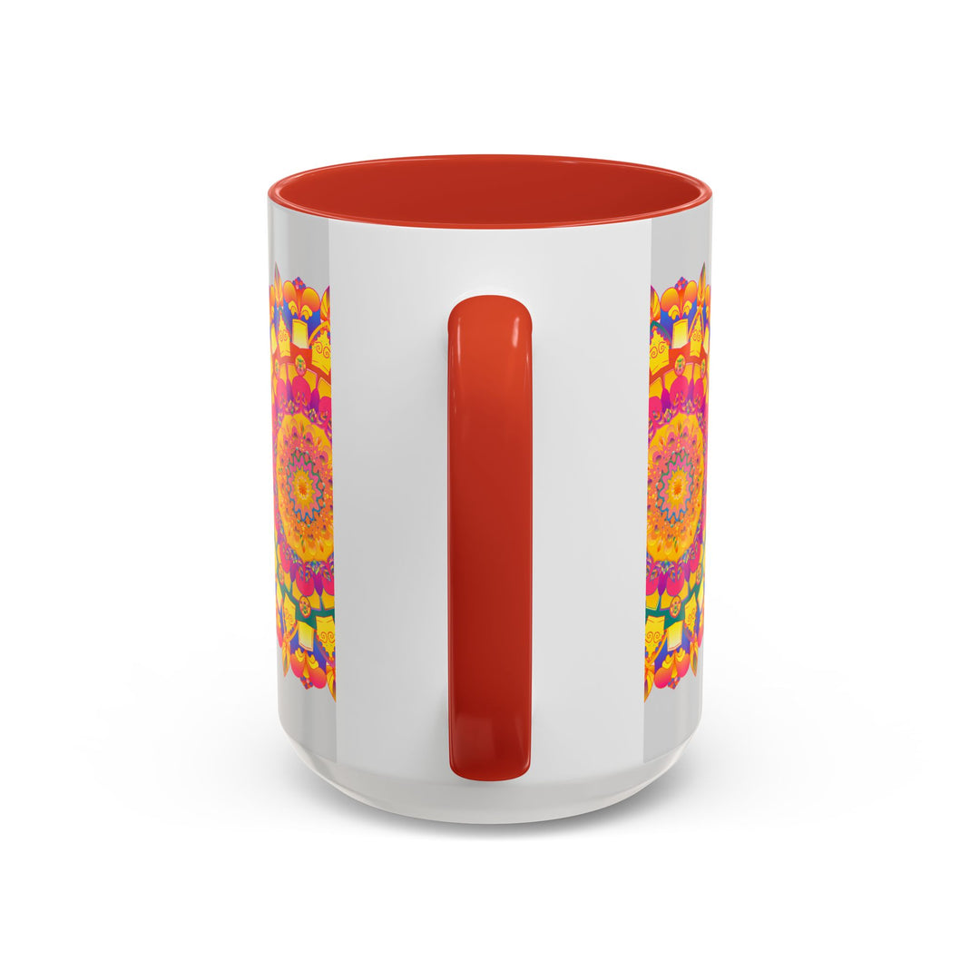 A close-up image of a ceramic mug with a mandala art design in vibrant colors against a grey background