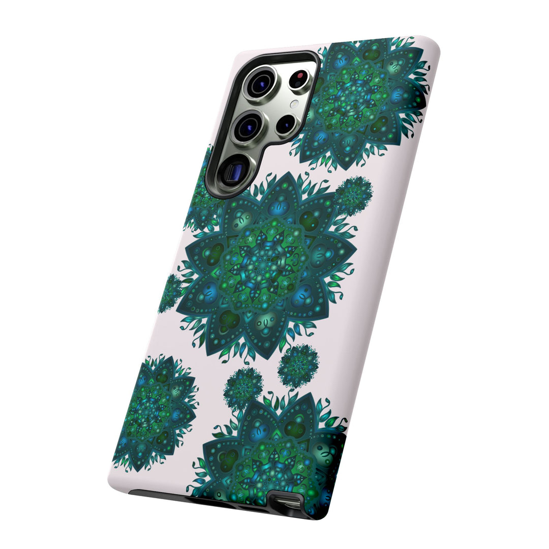 Beautiful light pink and green mandala phone case with a peaceful and intricate design