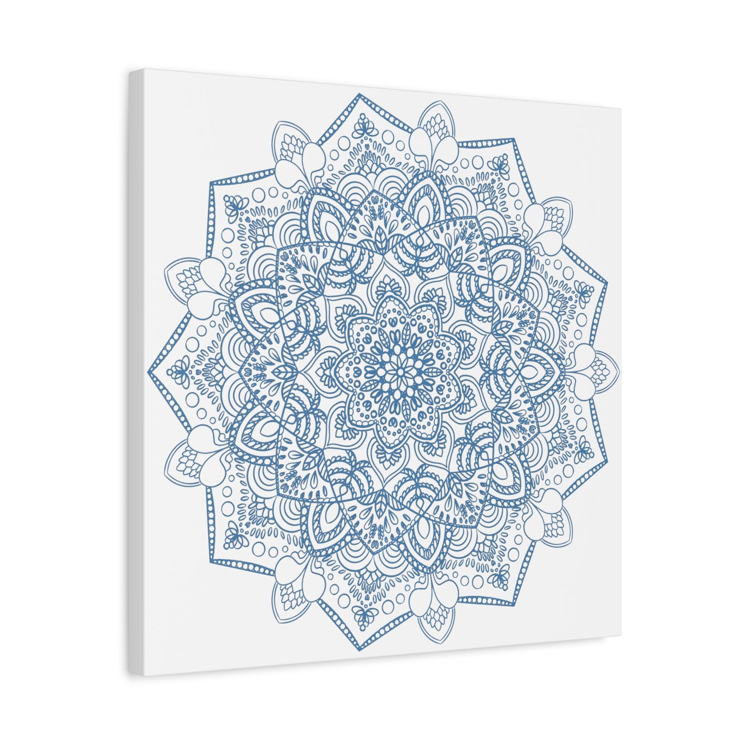 Beautiful handmade mandala art in steel blue, matte canvas, stretched, and 125 inches thick, perfect for adding a touch of elegance to your wall decor