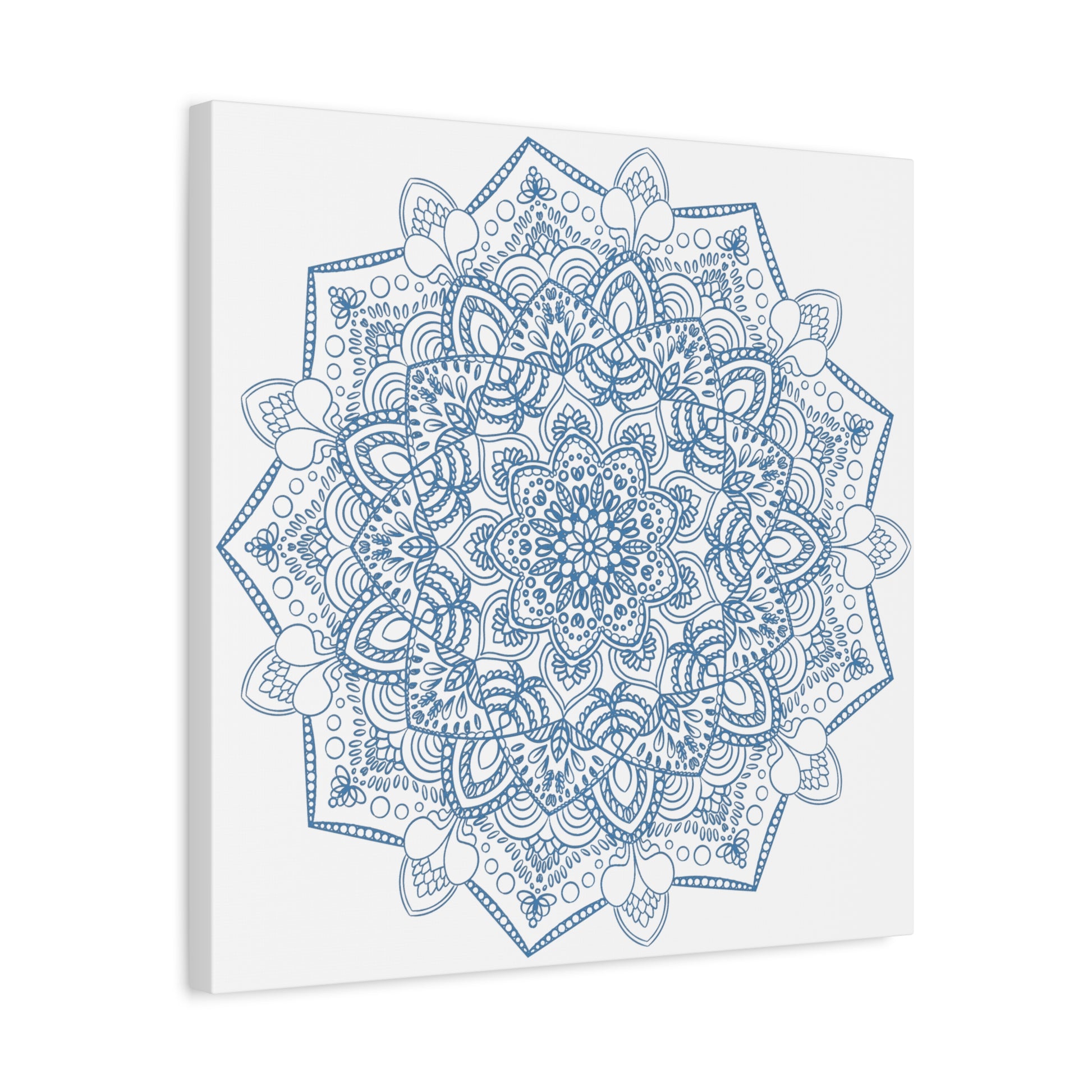 Beautiful handmade mandala art in steel blue, matte canvas, stretched, and 125 inches thick, perfect for adding a touch of elegance to your wall decor