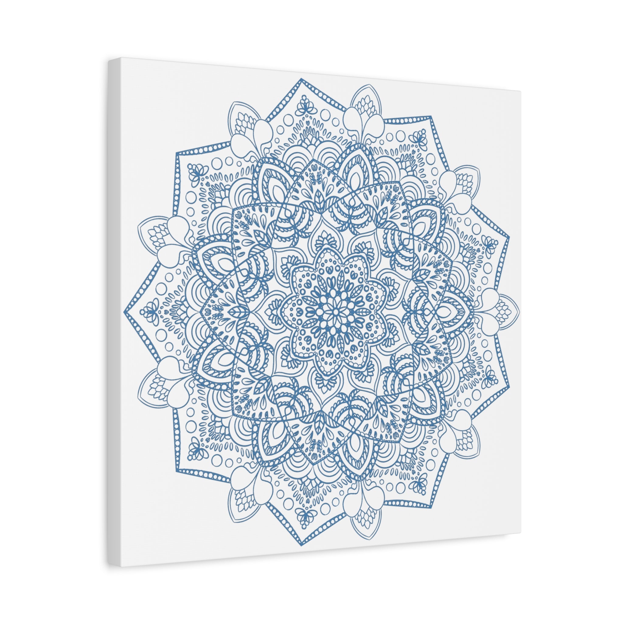 Beautiful handmade mandala art in steel blue, matte canvas, stretched, and 125 inches thick, perfect for adding a touch of elegance to your wall decor