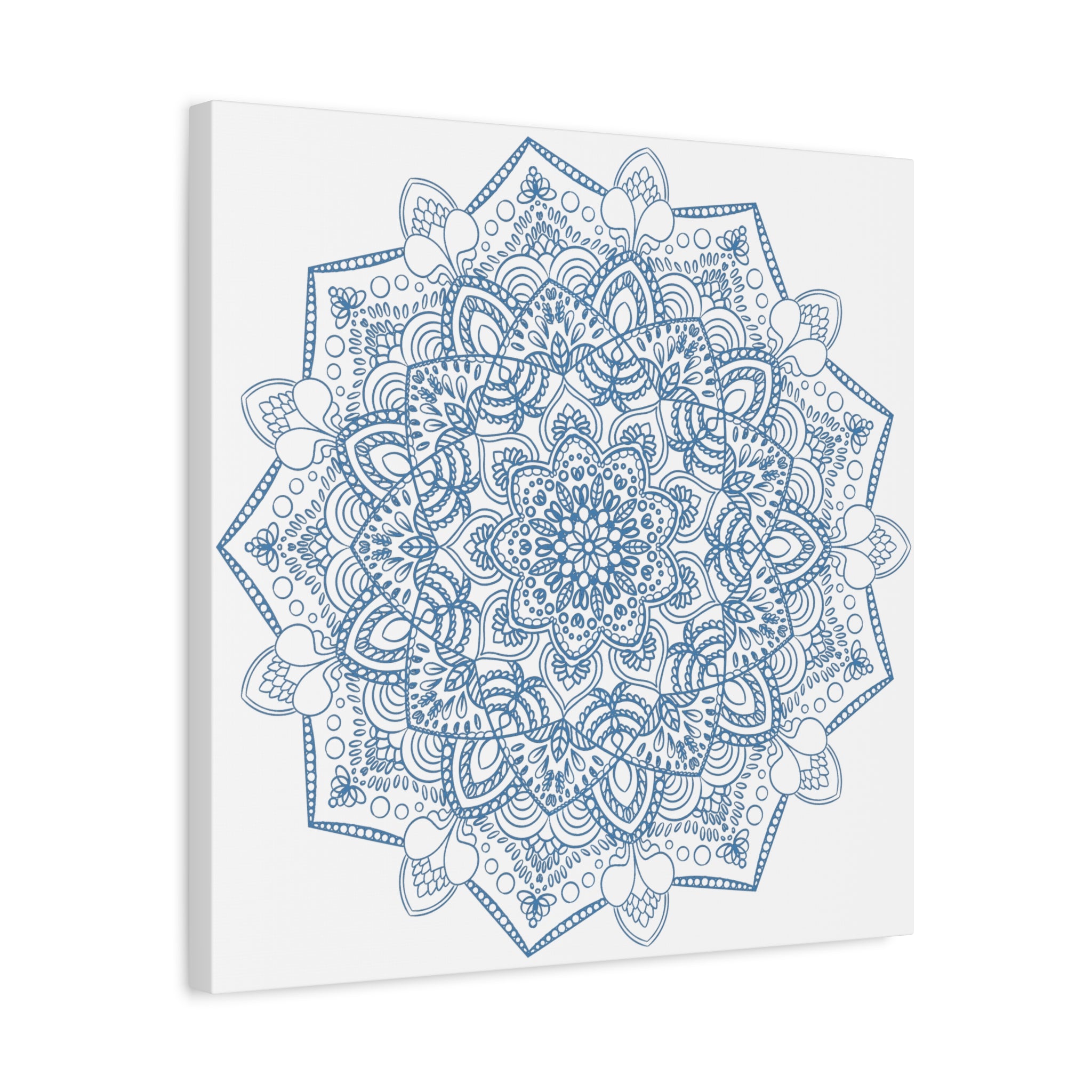 Beautiful handmade mandala art in steel blue, matte canvas, stretched, and 125 inches thick, perfect for adding a touch of elegance to your wall decor