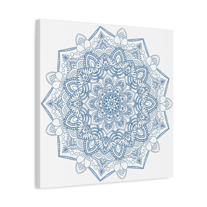 Beautiful handmade mandala art in steel blue, matte canvas, stretched, and 125 inches thick, perfect for adding a touch of elegance to your wall decor