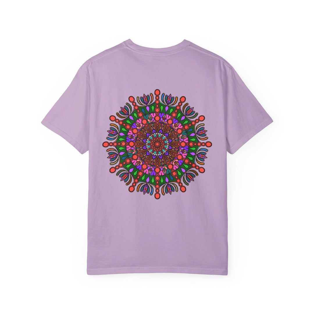 A comfortable unisex t-shirt made of 100% ring-spun cotton, garment-dyed for extra comfort, featuring hand-drawn mandala art