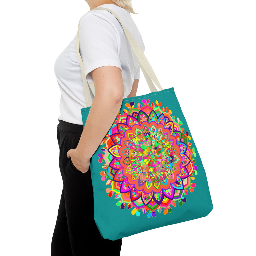 Beautiful aquamarine tote bag featuring a colorful mandala art design