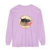 Sleeping grey and white tabby cat curled up in a watercolor-style bowl on a long sleeve t-shirt