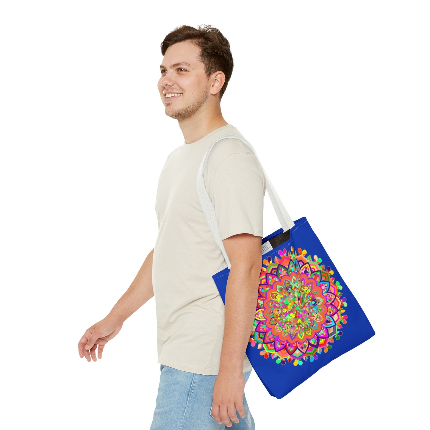 A dark blue tote bag featuring a colorful mandala art design