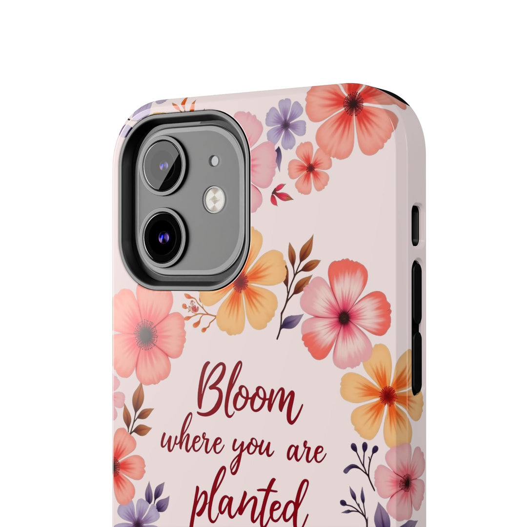 A light pink phone case with a beautiful flower garland bloom design