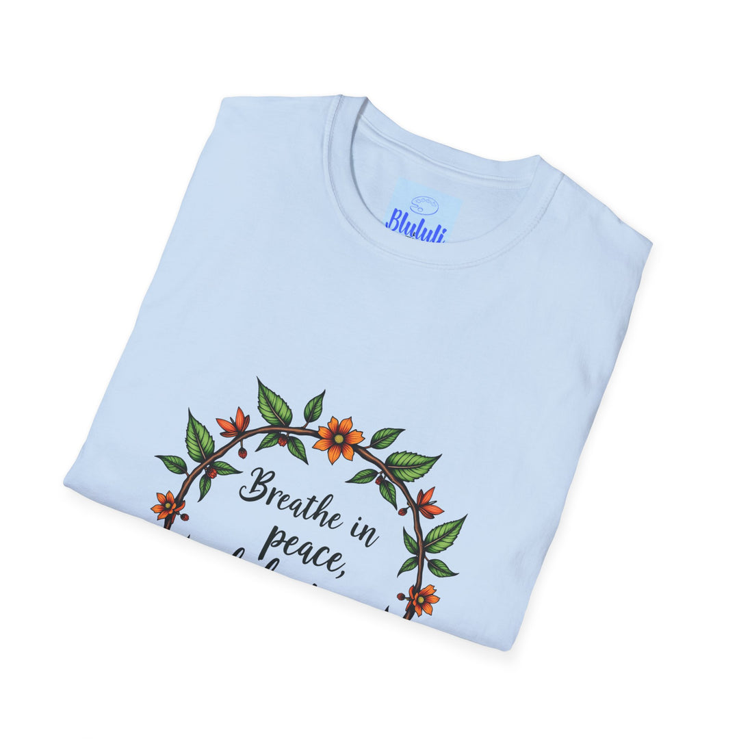 White t-shirt with colorful floral garland design and calming quote