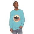 A watercolor illustration of a cute sleeping cat in a bowl on a long sleeve t-shirt