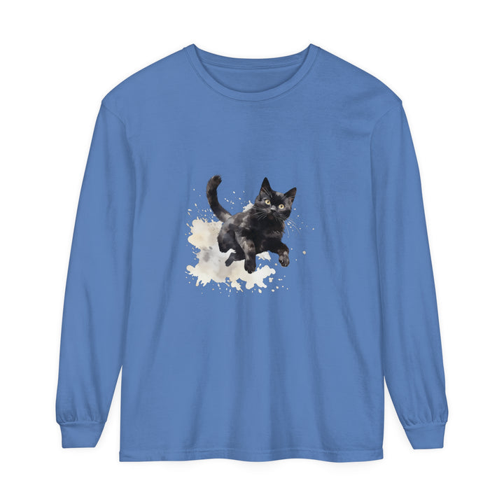 A close-up image of a black t-shirt with a watercolor splash design featuring a cat silhouette