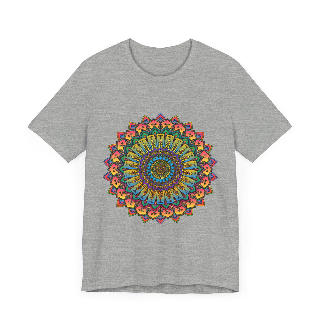 A close-up photo of an intricate mandala meditation tee in vibrant colors, featuring detailed patterns and symbols in shades of red, blue, green, and yellow