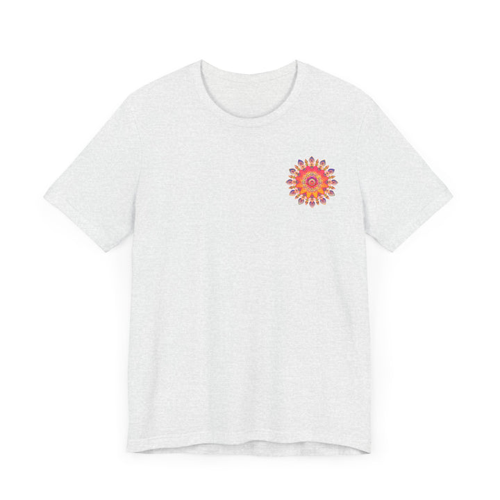 A close-up image of a vibrant mandala tee featuring intricate geometric patterns and symbols representing spiritual peace and harmony