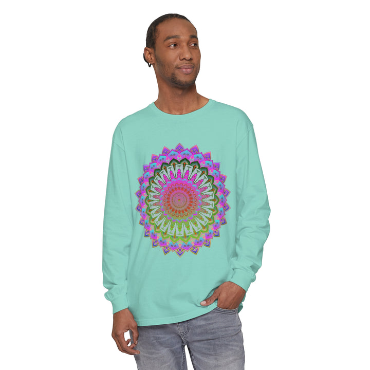 A close-up image of a colorful mandala design on a unisex long sleeve t-shirt