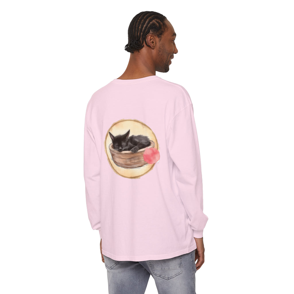 A watercolor illustration of a sleeping cat in a bowl on a long sleeve t-shirt