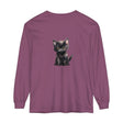 A close-up image of a cute black kitten with striking yellow eyes printed on a long sleeve t-shirt