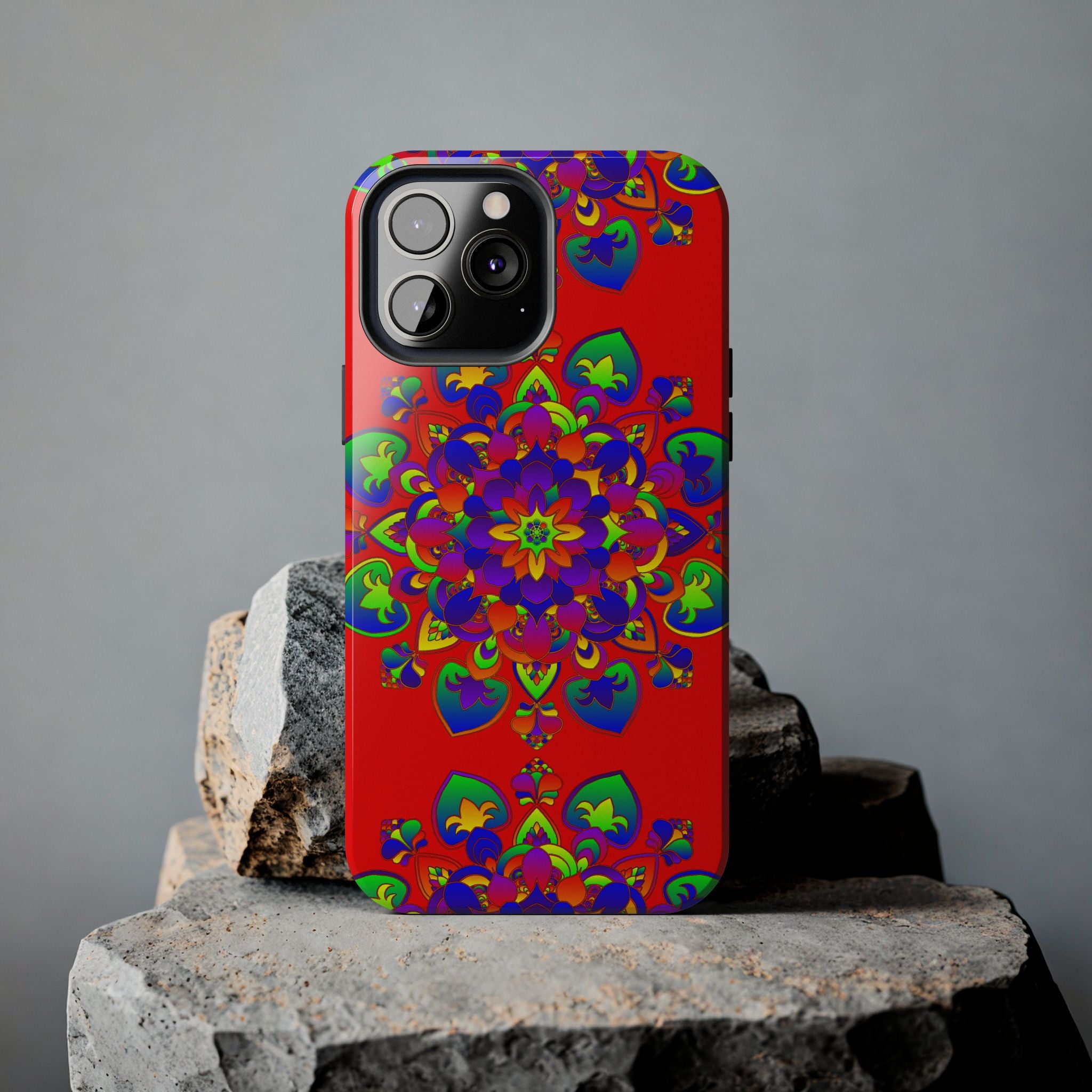 Hand drawn red mandala art phone case with intricate design and vibrant colors