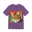 A colorful and vibrant short sleeve tee featuring a pop art style tabby cat design