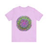 A close-up view of a vibrant mandala tee featuring colorful geometric art design