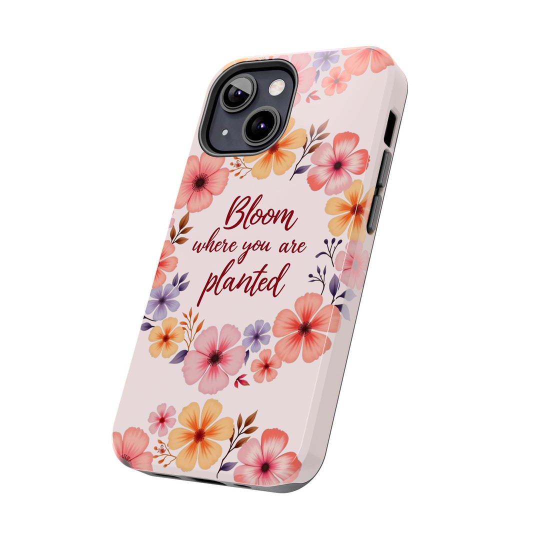 A beautiful light pink phone case with a flower garland bloom design