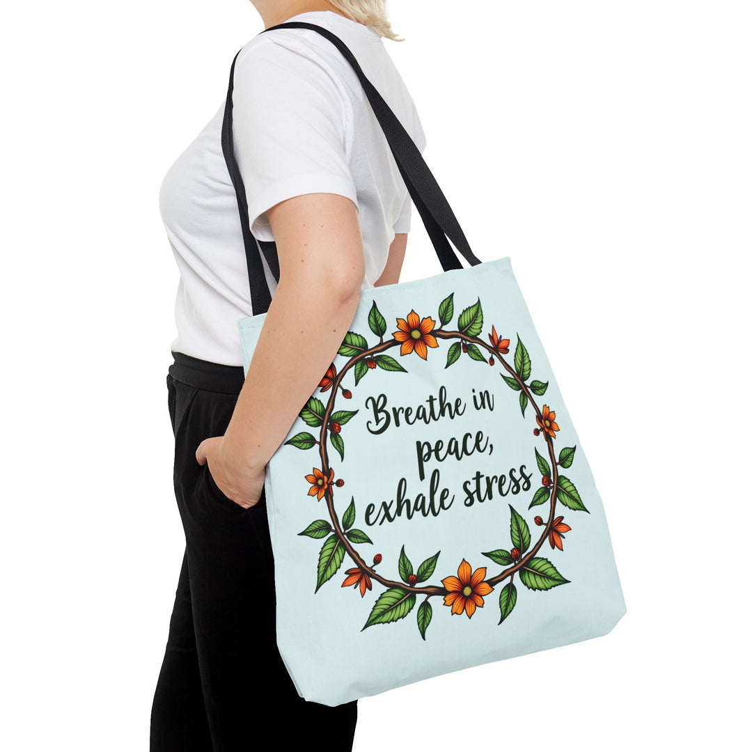 A white tote bag with a beautiful flower crown design, perfect for serene style fashion