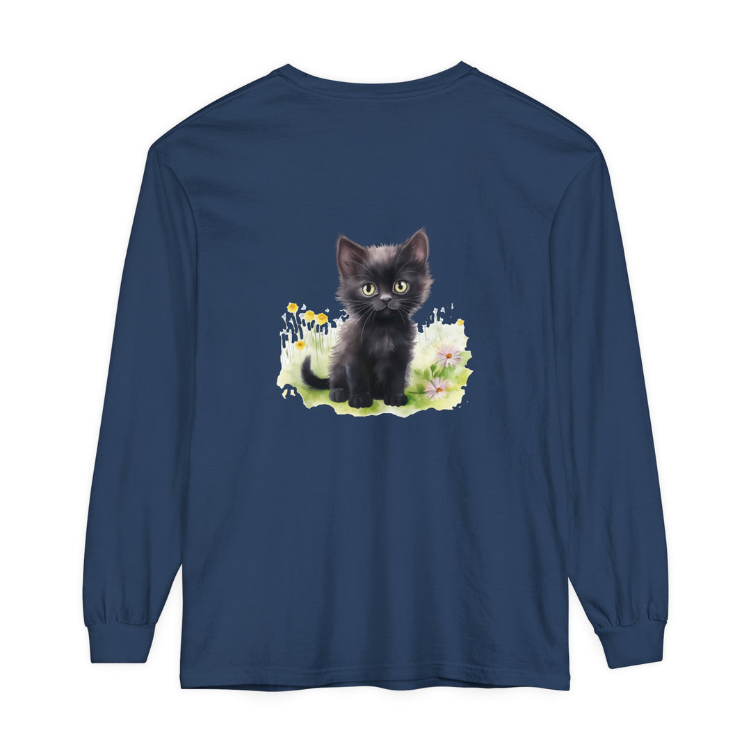 Black kitten wearing a floral crown standing in a colorful garden, printed on a long sleeve t-shirt