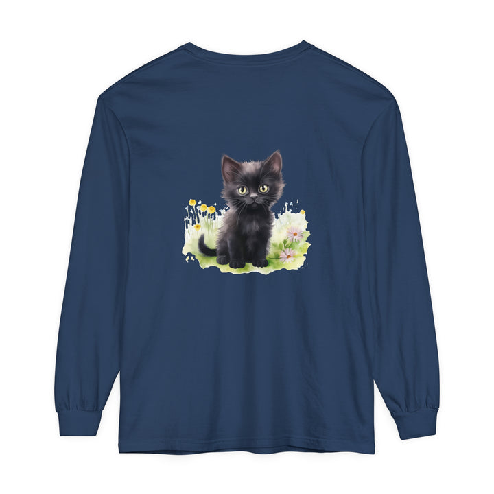 Black kitten wearing a floral crown standing in a colorful garden, printed on a long sleeve t-shirt