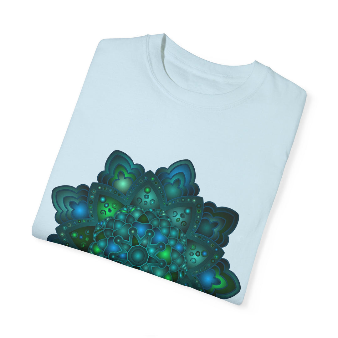 Intricate blue and green mandala design featured on a unisex t-shirt