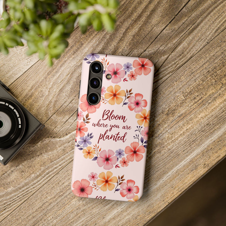 Beautiful light pink phone case adorned with a flower garland bloom design