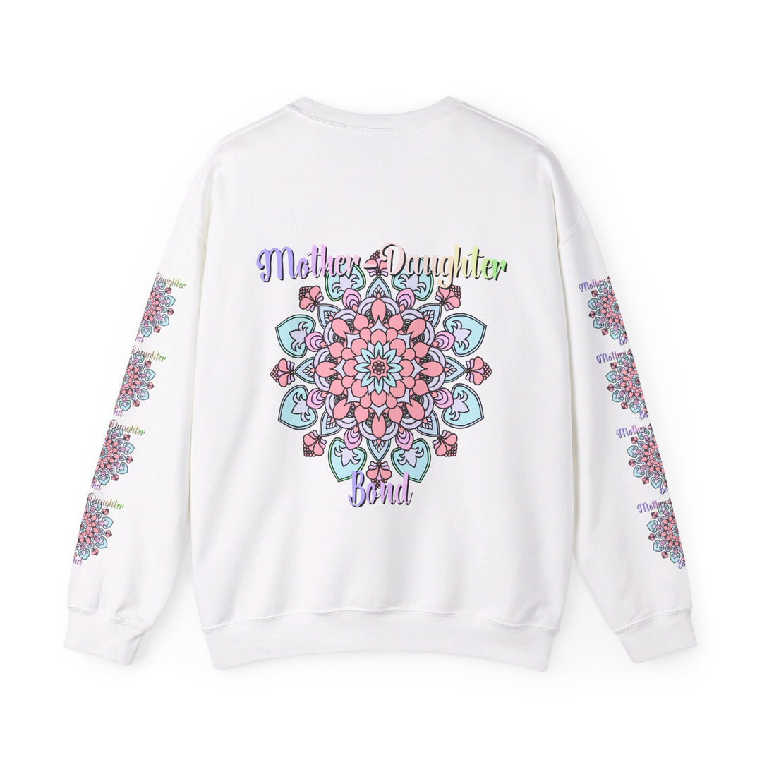 Mother and daughter smiling and hugging while wearing the Mother-Daughter Bond Unisex Heavy Blend™ Crewneck Sweatshirt, the perfect birthday gift for mom