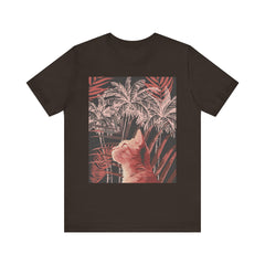A cute ginger cat lounging under a palm tree on a soft, comfortable t-shirt