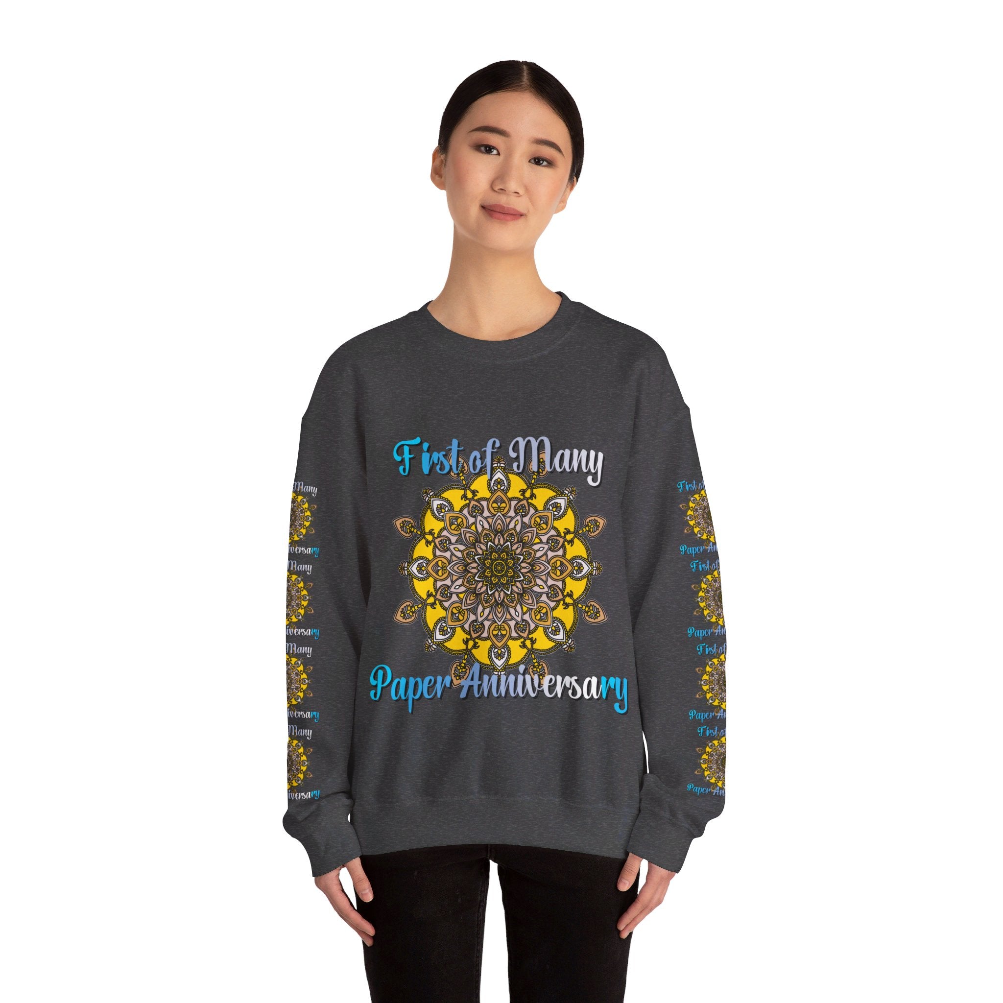 A cozy and stylish unisex crewneck sweatshirt, perfect for celebrating your first year wedding anniversary with the unique message First of Many, Paper Anniversary printed on it