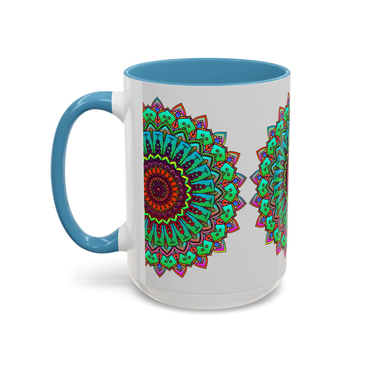 A light grey ceramic mug featuring a colorful mandala art design