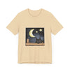 A black t-shirt featuring a sleepy cat against a moonlit night background