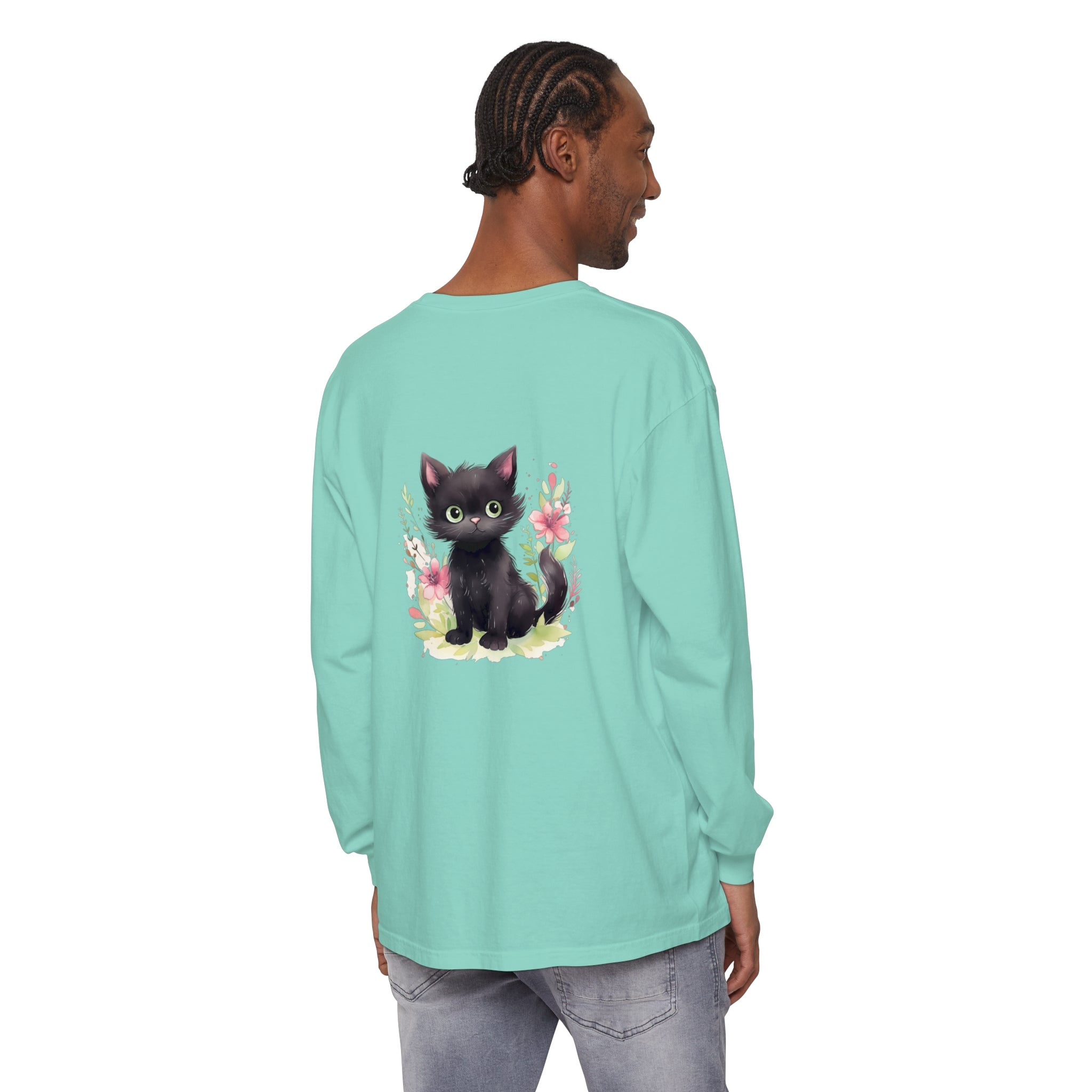 Adorable playful kitten surrounded by vibrant floral watercolor design on t-shirt