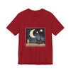 A cozy black t-shirt featuring a sleepy cat under the moonlit night